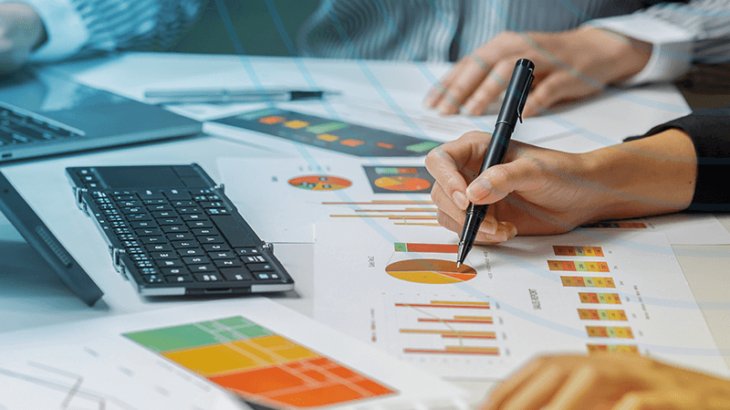 Professionals analyzing business performance charts